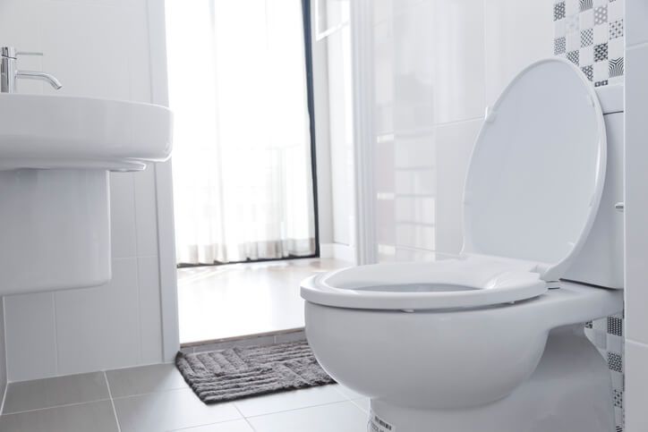 https://www.ezflowplumbingaz.com/images/blog/contemporary-toilet-in-white-bathroom.jpg