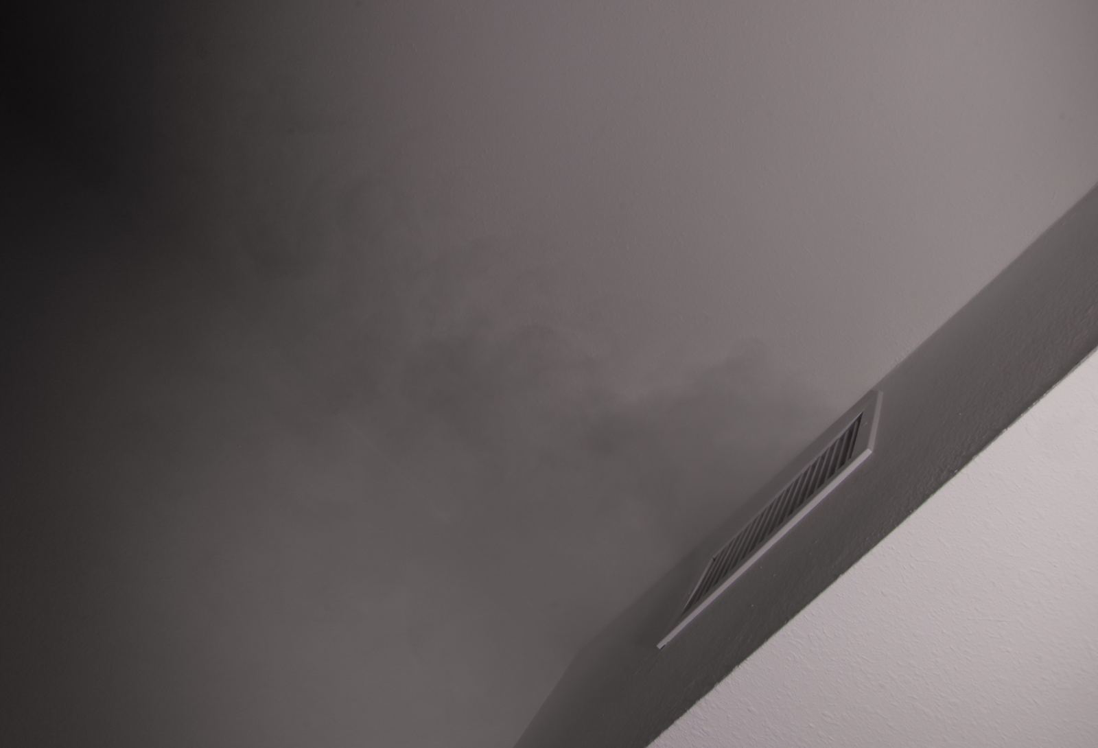 FogTrace fog escaping near a hidden vent breach during a Gilbert, AZ plumbing smoke test